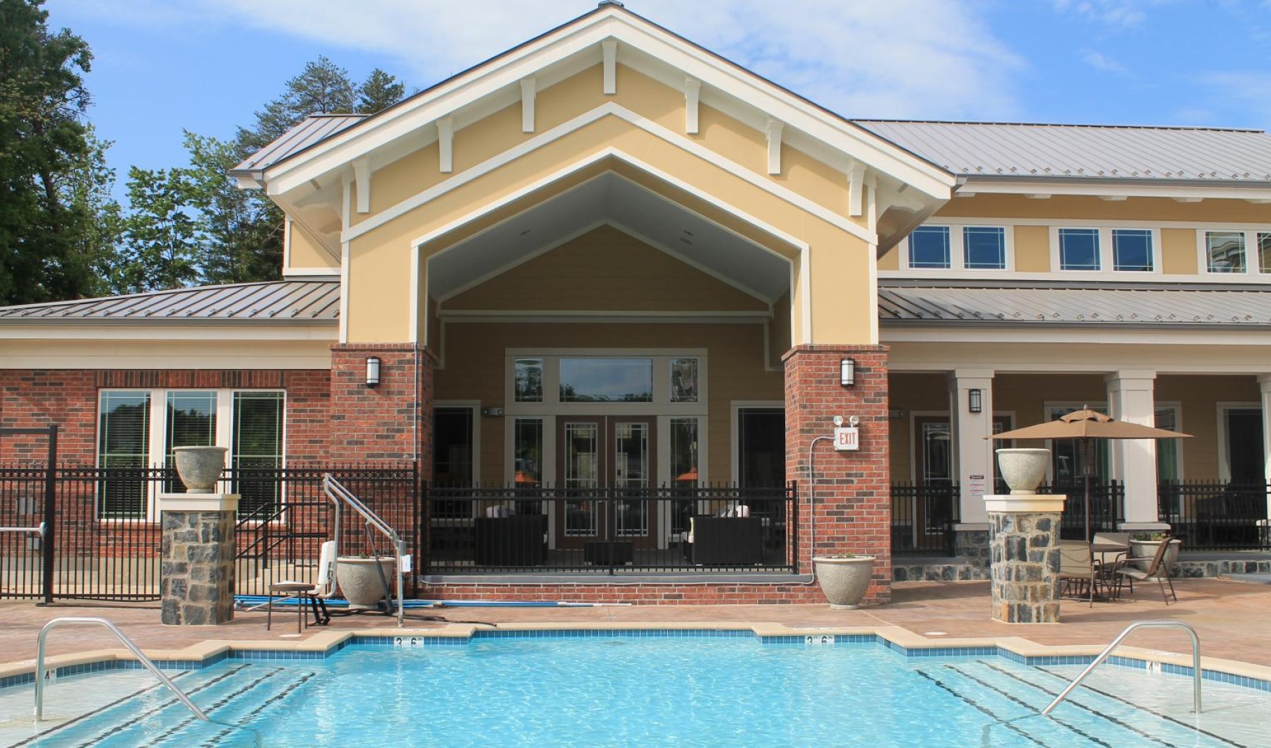 a large building with a pool
